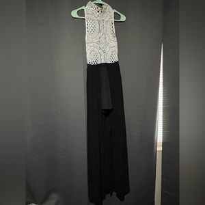 Black and white romper with maxi cape